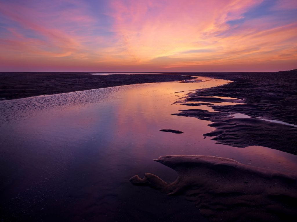 Coucher de soleil avec un air violet