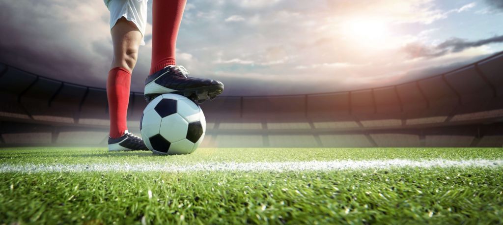 Stade avec un joueur de football