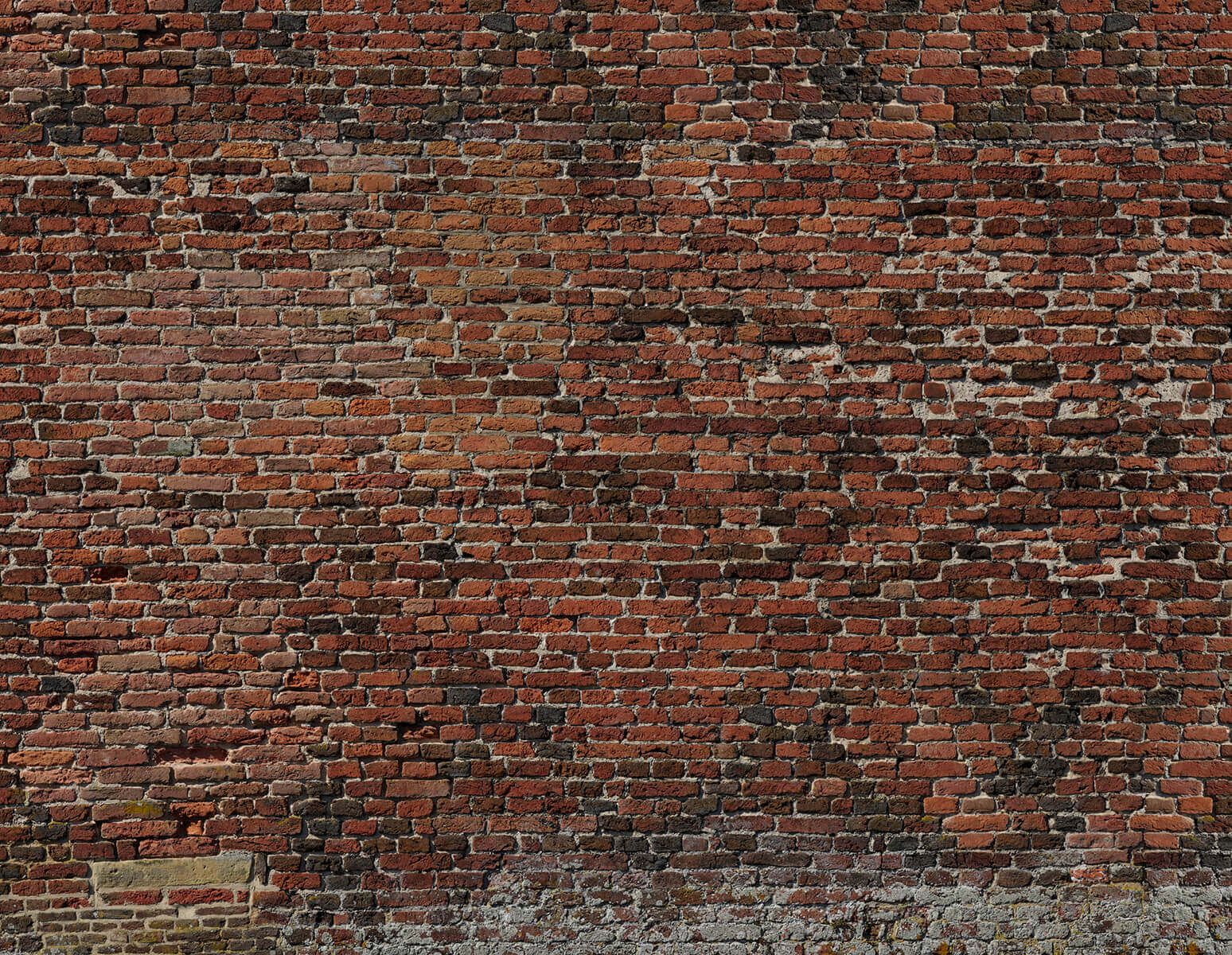 Ancien mur de briques restauré