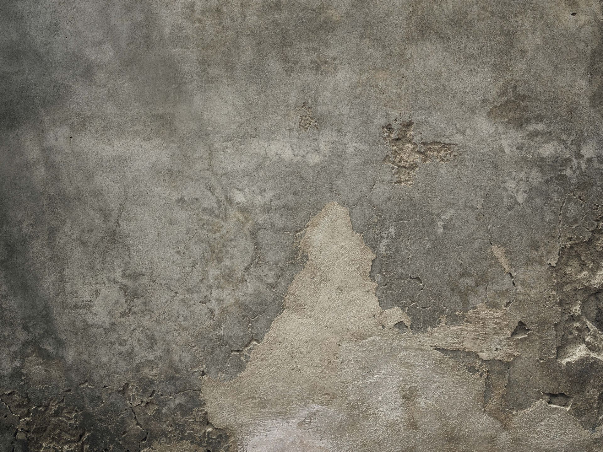 Béton fissuré avec stucco main product photo