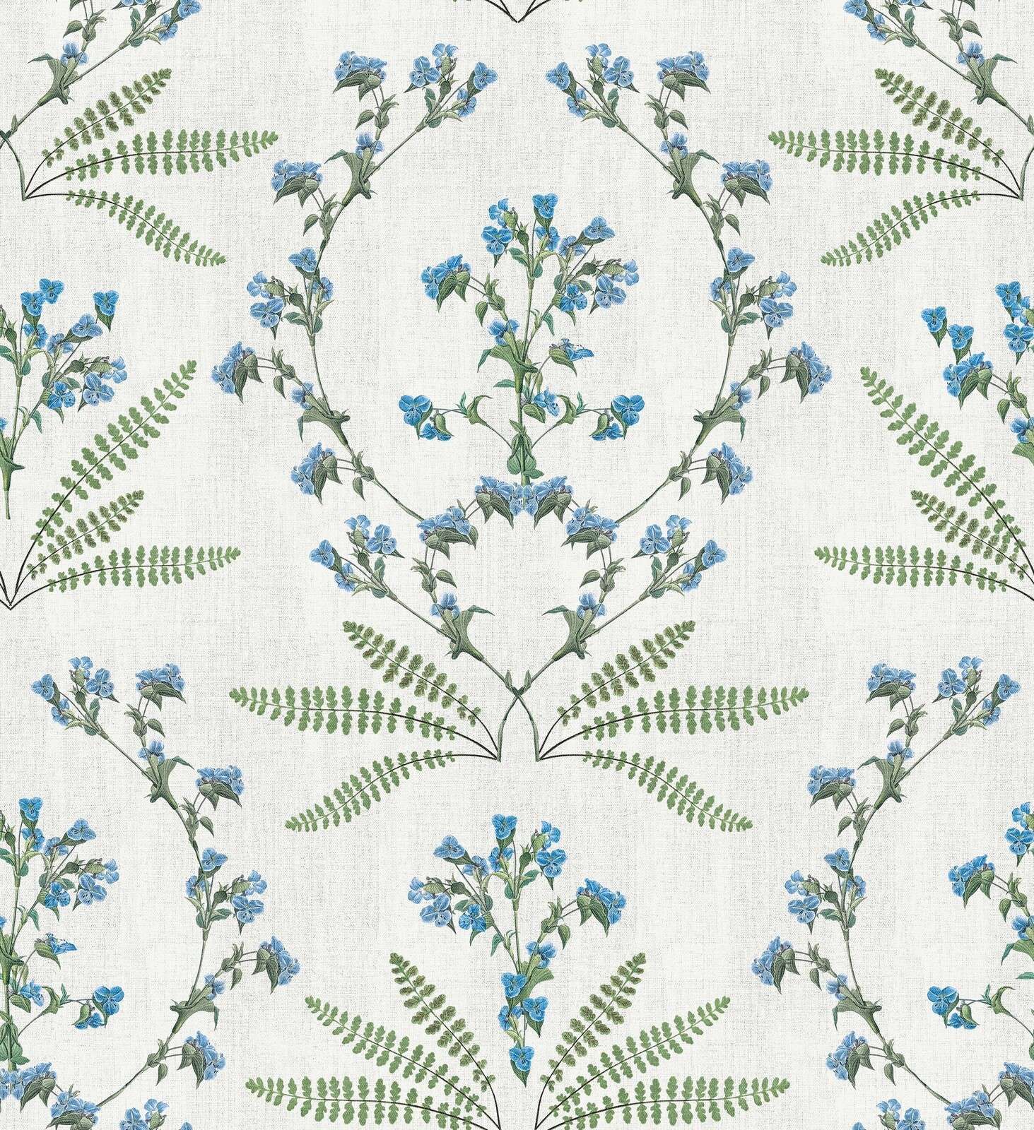 Rameaux fleuris bleus avec des fougères